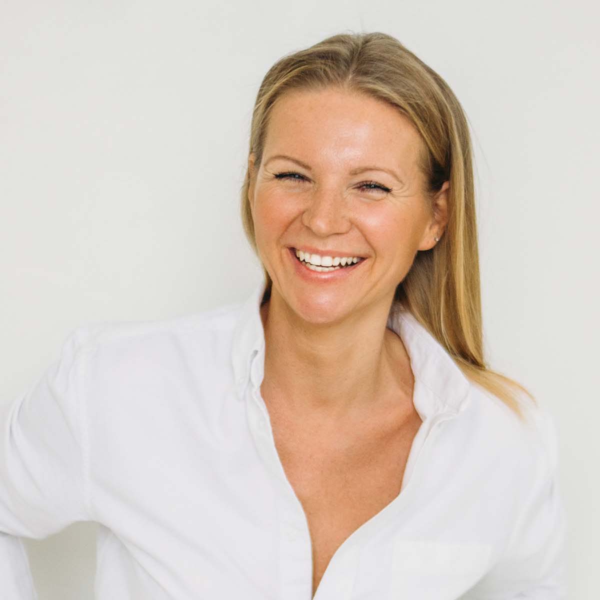 portrait of happy blonde forty year woman with 9R63R8S.jpg